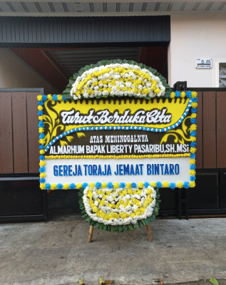 Papan Bunga Duka di Koli